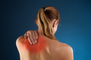female upper back pain treated by chiropractor